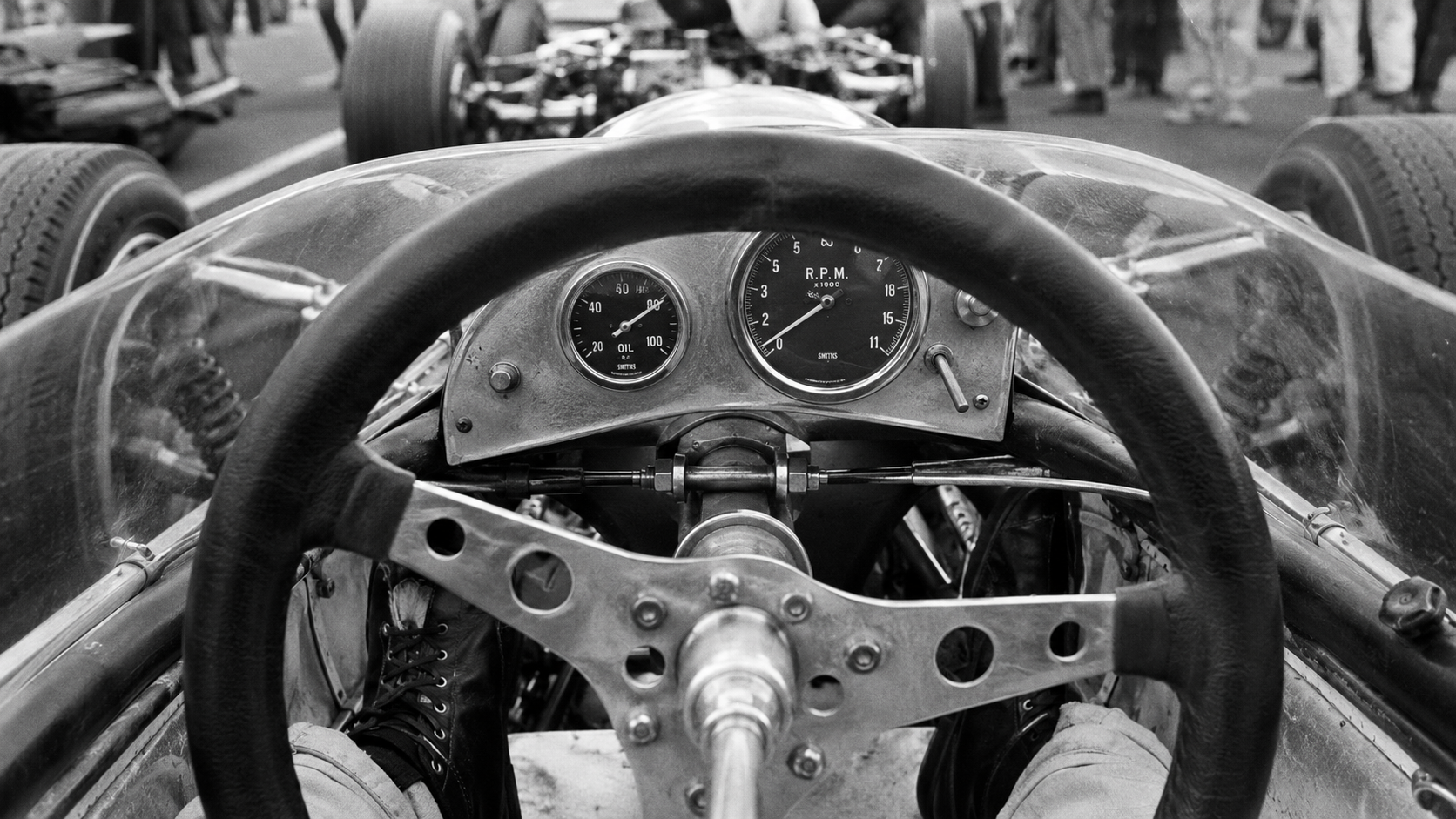 Cockpit POV — steering wheel & RPM